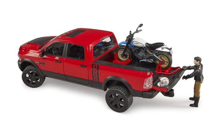 RAM 2500 Power Wagon with Scrambler Ducati Desert Sled and Driver
