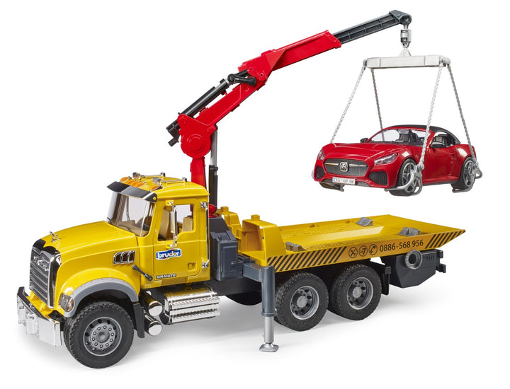 MACK Granite Tow Truck with BRUDER Roadster