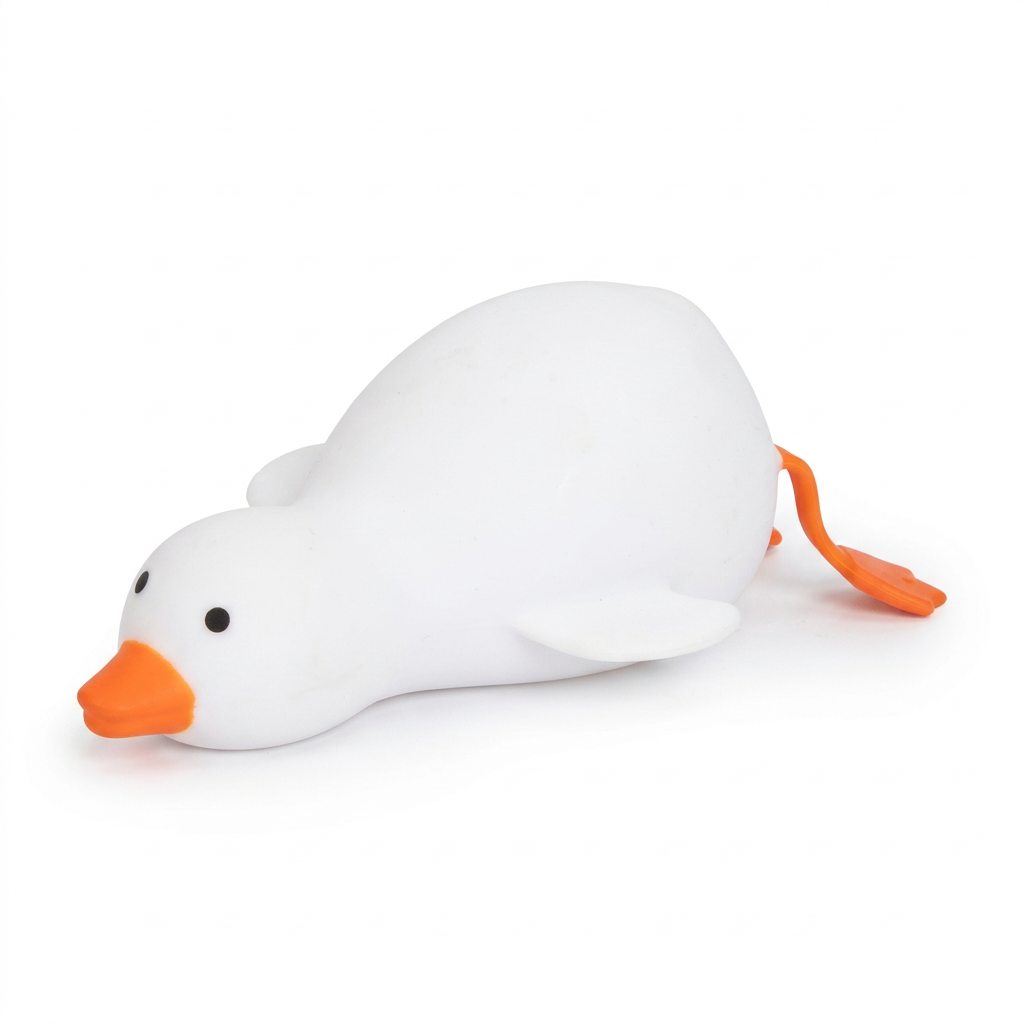 White squishy duck lying down, side view