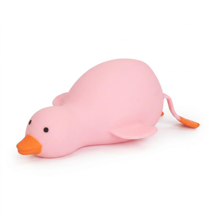 Pink squishy duck lying down, side view